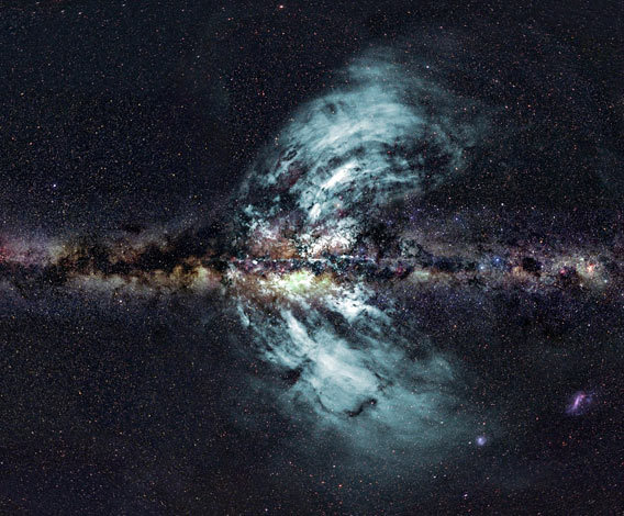 Combined optical and radio image of two huge eruptions of material flowing out of the Milky Way galaxy. And you very much want to click it to embiggen.