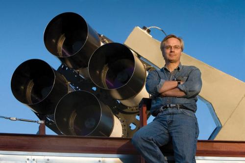 Los Alamos National Laboratory astrophysicist Tom Vestrand poses with a telescope array that is part of the RAPTOR (RAPid Telescopes for Optical Response) system Read more at: http://phys.org/news/2013-11-black-hole-birth-captured-cosmic.html#jCp