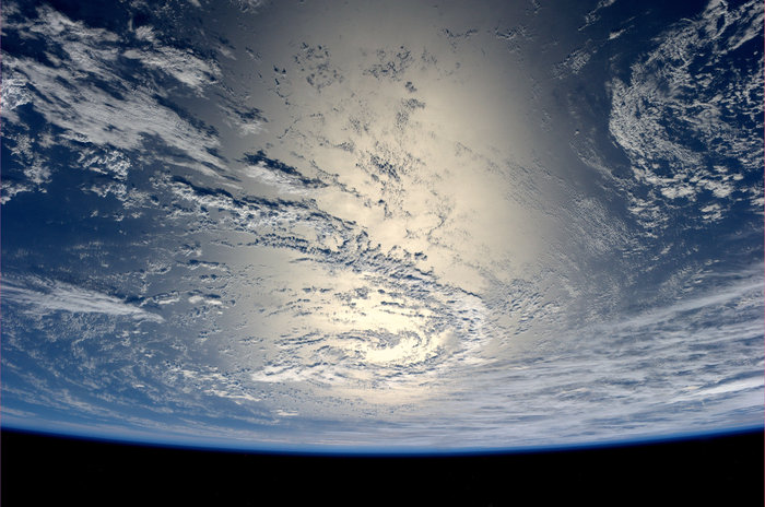Earth_glinting_in_the_sun_node_full_image_2