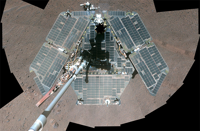 This March 22, 2014, self-portrait of NASA’s Mars Exploration Rover Opportunity shows the effects of wind events that had cleaned much of the accumulated dust off the rover’s solar panels