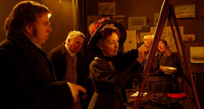 Ο ζωγράφος Turner, ο πατέρας του με την ερευνήτρια Somerville να πραγματοποιεί το πείραμα μαγνήτισης μιας βελόνας από τις ιώδεις ακτίνες του ηλιακού φάσματος