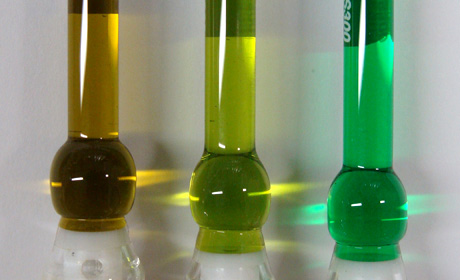 Solutions of the three metal carbene complexes of copper, silver and gold (left to right)